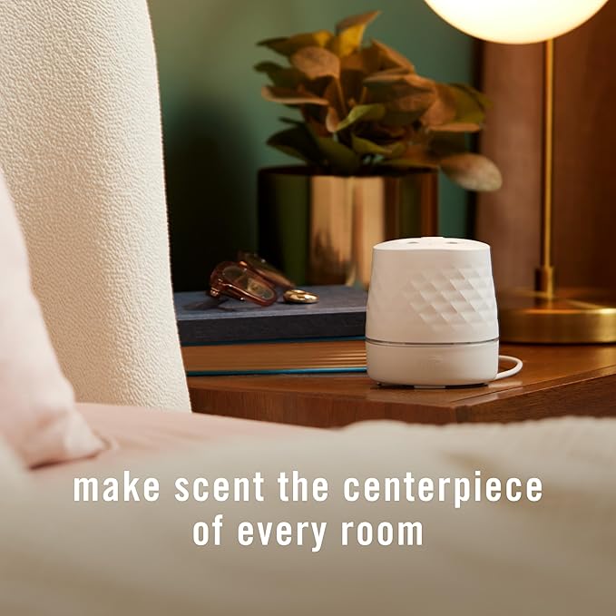 Febreze Plug Scent Booster Starter Kit, Oil Diffuser, Air Freshener Plug in, Continuous Scent Device + 2 Downy Calm Refills